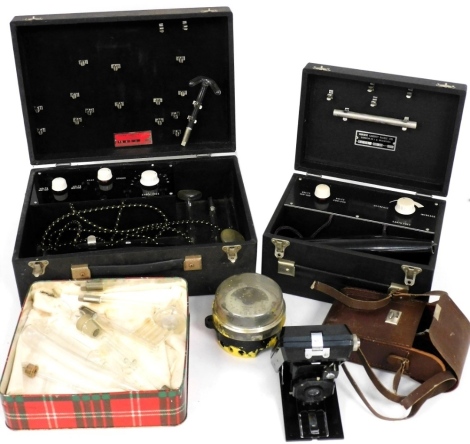 A group of items, to include an Osborne Garret and Co Limited electric shock set, various accessories, another similar, a box camera, etc. (a quantity)