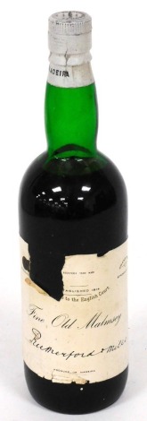 A bottle of Old Malmsey Rutherford Miles Bordeaux Madeira wine, label marked 1907.