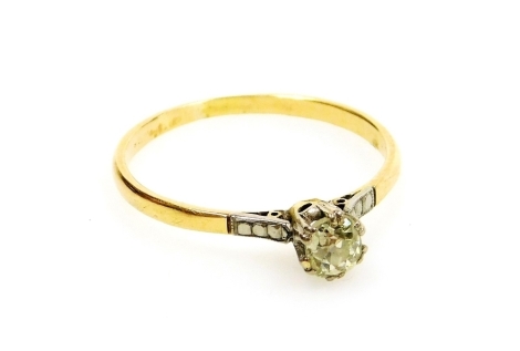 A rose cut diamond solitaire ring, set in yellow and white metal, approx 0.5cts, size W, 2.6g.