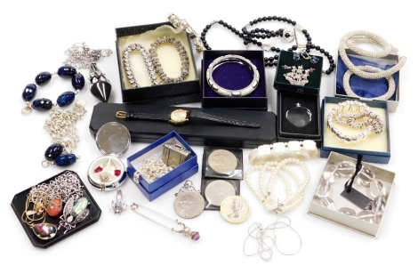 A group of costume jewellery and effects, marquisette and egg shaped necklace, ships brooch, Midland Bank collectors coins, modern necklaces, etc. (a quantity)