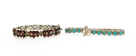 Two silver bracelets, comprising a silver hinged bangle with marcasite and red paste stones, 6cm diameter, and a silver and turquoise set line bracelet, 47.2g all in. (2)