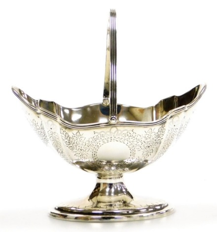 A Victorian silver basket, the body bright cut engraved with flowers, bows and wreaths, on a stepped base, Thomas Bradbury & Sons, London 1884, 9cm high, 4½oz.