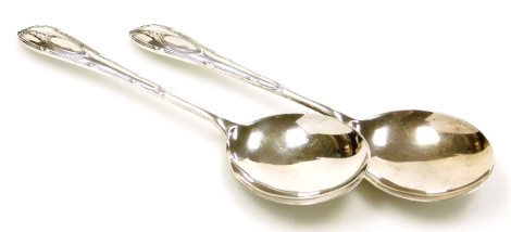 A pair of George V silver serving spoons, with circular bowls and decorated handles, Sheffield 1925, 4¾oz.