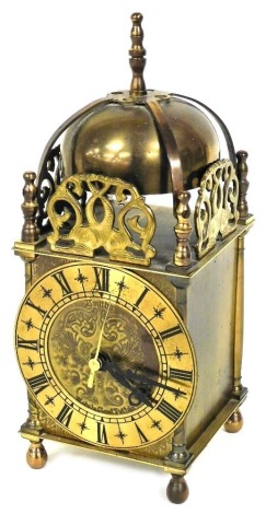 A Smiths brass lantern clock, the dial stamped Smiths Great Britain, with quartz movement, 15cm high.