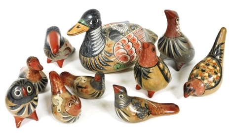 Various Mexico JJ studio style pottery bird ornaments, to include a duck, 23cm high, each vibrantly coloured with flowers. (a quantity)