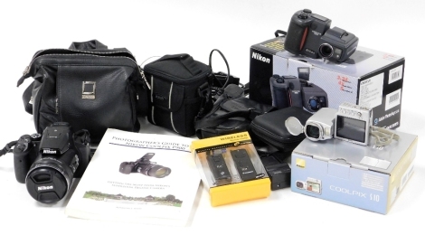 A Nikon Coolpix P900 camera, with lens, a small Nikon Coolpix S10 camera, etc. (a quantity)