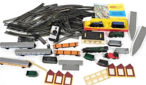 A Triang Hornby part train set, including the Flying Scotsman, diesel locomotive, coaches, wagons, buildings, track, controller, etc. (a quantity)