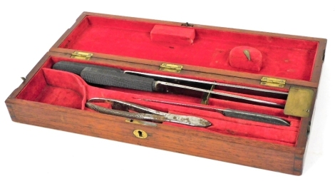 A 19thC cased surgeon's style set, to include plier, knives, in a fitted case, 40cm wide.