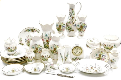 Various Aynsley Wild Tudor pattern wares, to include a vase with flared rim, 29cm high, pierced dish, various plates, other items, ornaments, vases, clock, etc. (a quantity)