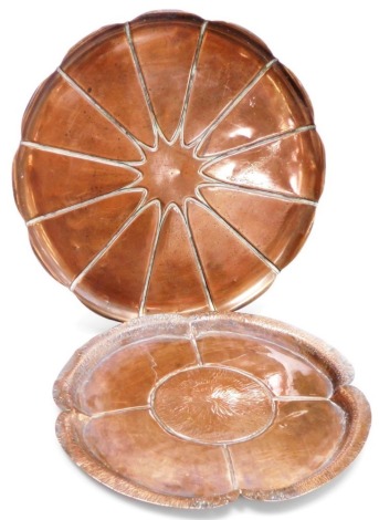 A Victorian Arts & Crafts copper tray, designed by Benson & Heywood, in the form of a lily pad, stamped to underside WAS Benson, and registration number, 39.5cm diameter, and a further tray of quatrelobe form, also modelled as a lily pad, unmarked, 36.5cm