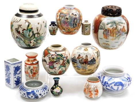 A group of Chinese and Japanese porcelain, to include a ginger jar and cover, decorated with birds, flowers and leaves, a small blue and white bowl decorated with carp, a ginger jar with wooden lid, etc. (a quantity)