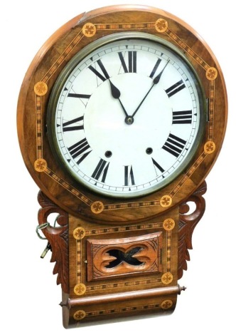 A late 19thC American walnut and parquetry drop dial wall clock, the painted dial bearing Roman numerals, eight day movement, the case of circular form, 66cm high.