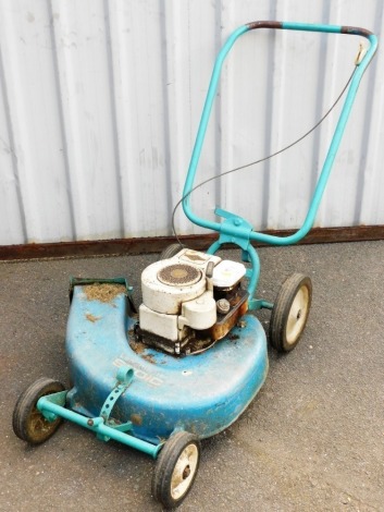 A Stoic Land Master Mark II petrol lawn mower, with side ejection, Briggs Stratton motor, etc. (AF)