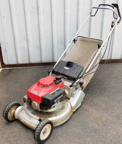 A Honda HR198 petrol lawn mower.