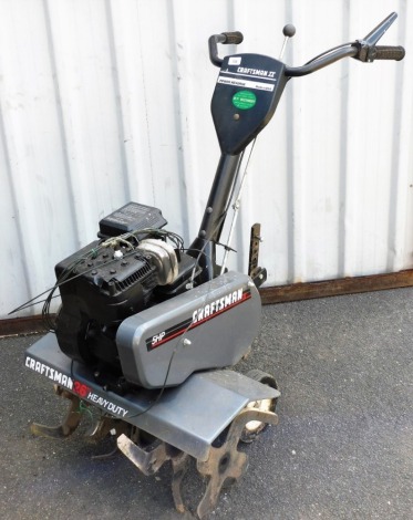 A Craftsman 2 petrol rotavator.