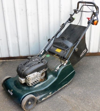 A Hayter Harrier 56 petrol lawn mower.