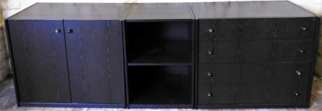 Three Team Sieben ebonised wood base units, comprising a two door cupboard, open bookcase, with single shelf, and a chest of four drawers, each 67.5cm high, 47.5cm deep, two door cupboard and chest of drawers, 80cm wide bookcase 48cm wide. (3)