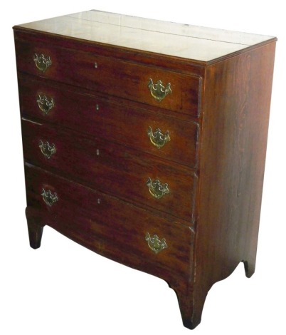 An early 19thC and later oak chest of four long drawers, on bracket feet, 102cm high, 89cm wide, 47cm deep.