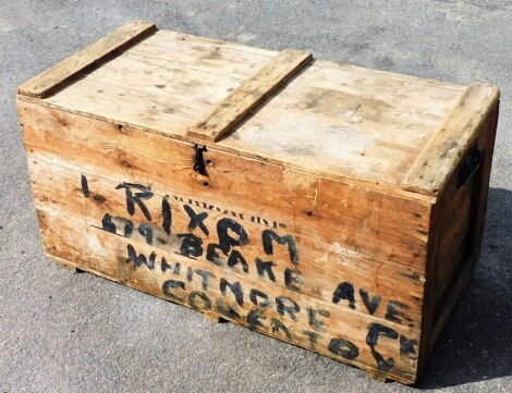 A stripped pine tool chest, the hinged lid enclosing part fitted interior, painted with inscription to front, 99cm wide.