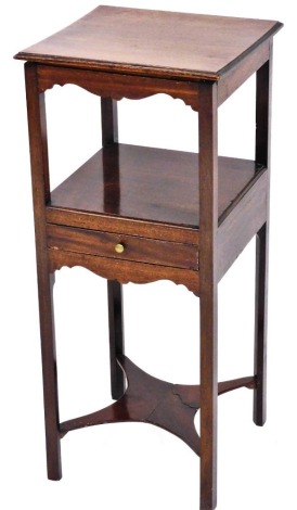 A 19thC mahogany wash stand, the square top with a moulded edge above an under tier with frieze drawer, on canted legs with X shaped under tier, 80cm high, 35cm wide.