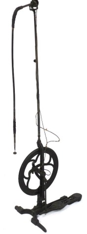 A Victorian cast iron engraver's drill, with spoked wheel and pierced pedal, 137cm high.