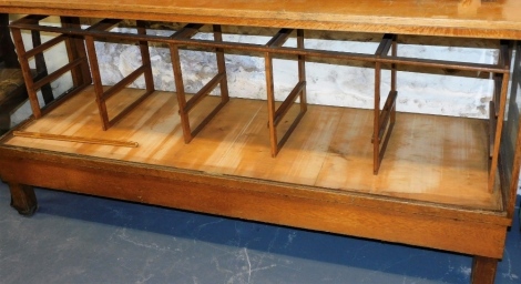 A Harris and Sheldon oak shop counter, with a glazed front and sides, 92cm high, 182cm wide, 61cm deep. (AF)