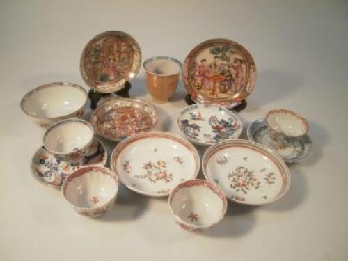 An assortment of Chinese tea bowls and cafe-au-lait cups and saucers including