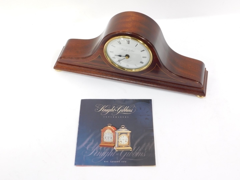 A Knight & Gibbins of London mantel clock, the Napoleons hat case with