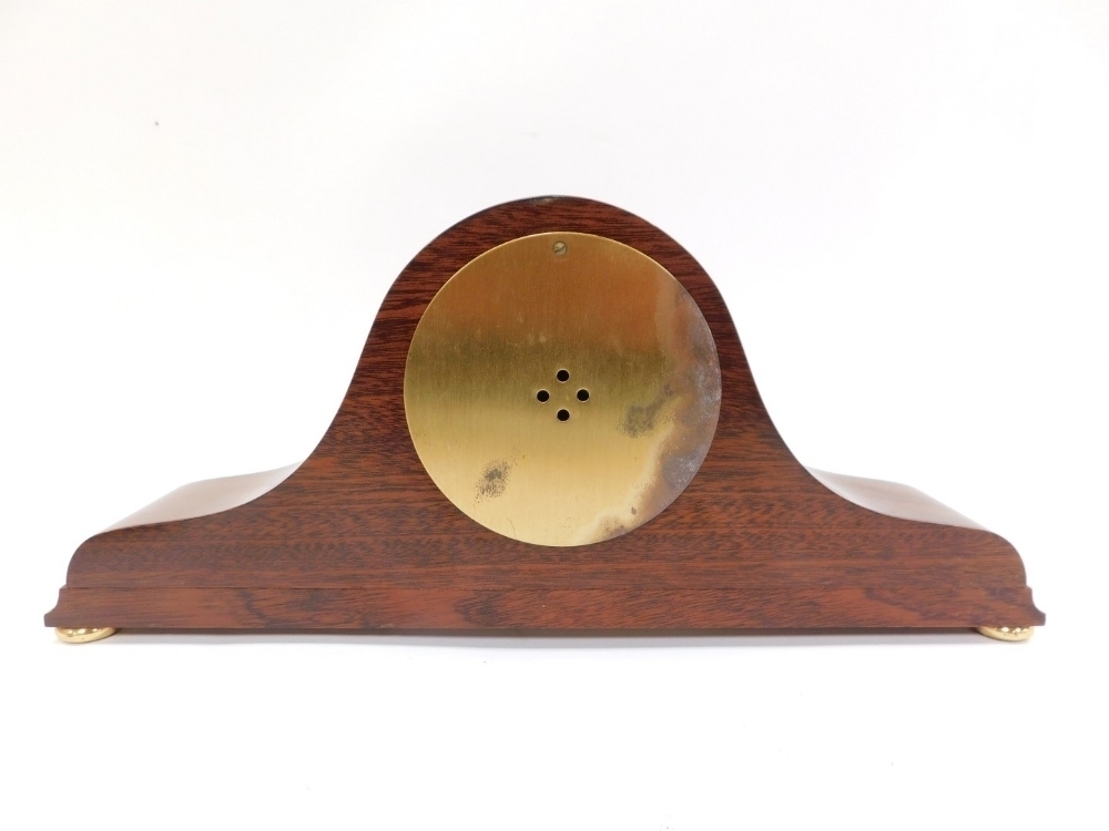 A Knight & Gibbins of London mantel clock, the Napoleons hat case with