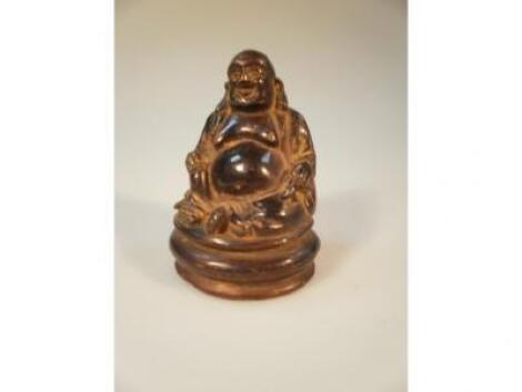 A 20thC bronze figure of a seated Buddha