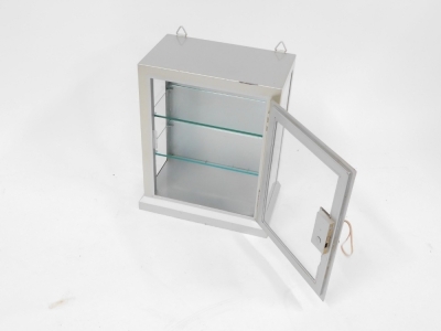 A steel glass display cabinet, with folded cornice top and single shelf, with key, 46cm high, 38cm wide, 21cm deep. - 2