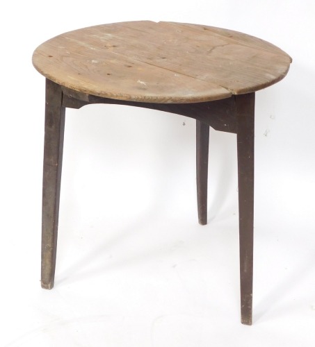 A late 18thC oak cricket table, with three plank top on tripod square taper base, 73cm high, 71cm diameter. (AF)