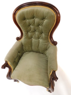 A Victorian mahogany spoon back armchair, the shield back with button detailing, 102cm high, 68cm wide, 60cm deep. - 2