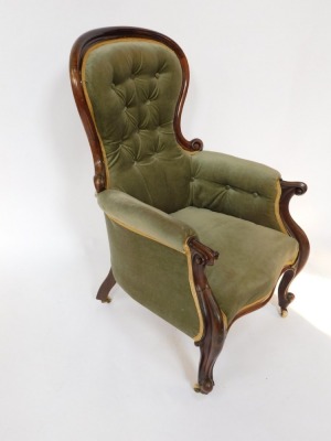 A Victorian mahogany spoon back armchair, the shield back with button detailing, 102cm high, 68cm wide, 60cm deep. - 3