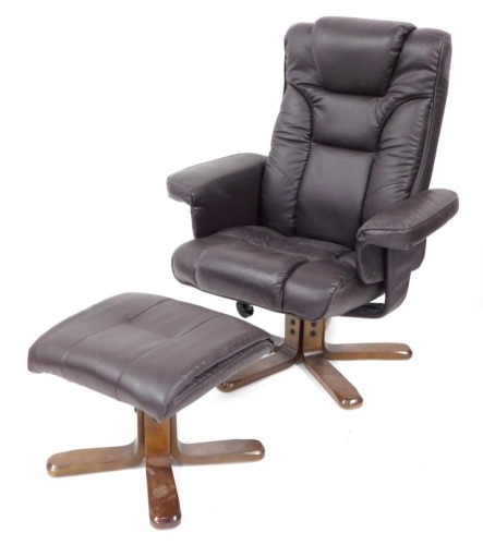 A Julian Bowen dark brown leatherette armchair and matching footstool. (2)