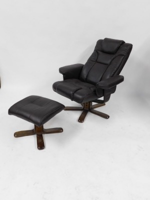 A Julian Bowen dark brown leatherette armchair and matching footstool. (2) - 3