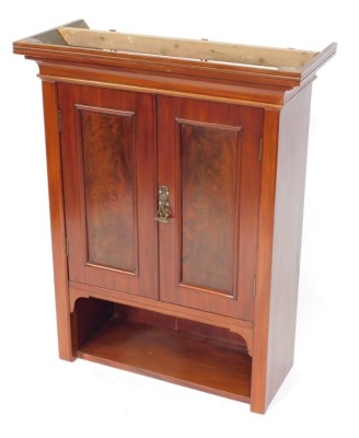 A mahogany wall hanging cupboard, with moulded cornice and two single drawers with single shelf base, 93cm high, 74cm wide, 31cm deep.