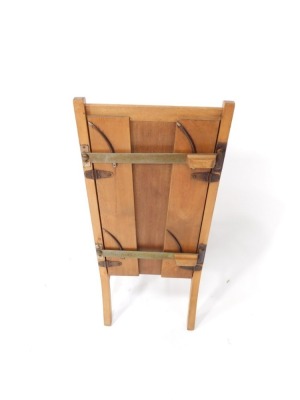 An Arts & Crafts style light beech chair/trouser press, with solid seat and back, raised on turned legs, united by spindles, 89cm high, 40cm wide, 38cm deep. - 2