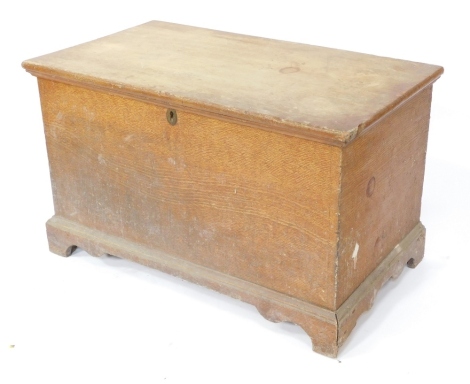 A Victorian painted pine blanket box, of plain design, converted with castors to base, 61cm high, 102cm wide, 58cm deep.