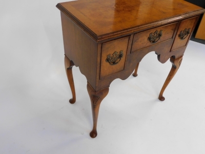 A Georgian style walnut lowboy, with one short and two deep drawers above a shaped apron, raised on shell carved cabriole legs, 59cm high, 74cm wide, 41cm deep. - 3