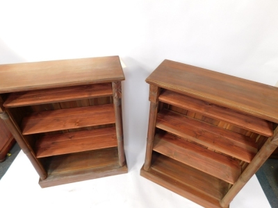 A pair of Victorian mahogany open bookcases, each with three pine shelves, flanked by turned demi pilasters, raised on plinth bases, 122cm high, 89cm wide, 33.5cm deep. - 2