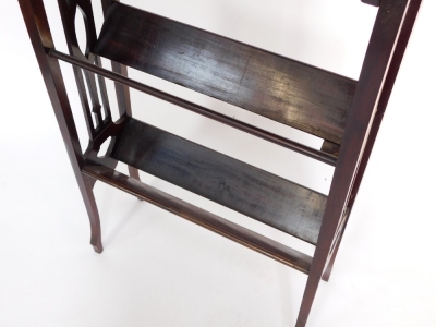 An Edwardian mahogany book trough, with fretwork sides, having two troughs, raised on slender cabriole legs, 59cm high, 57cm wide, 21cm deep. - 3