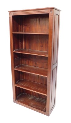 A Victorian style mahogany open bookcase, with four adjustable shelves, raised on fluted plinth base, 176cm high, 81cm wide, 34cm deep.