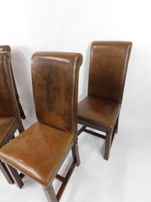 A set of four brown leather and oak framed dining chairs. - 3