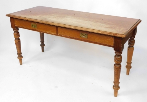 A Victorian mahogany writing table, with two frieze drawers, raised on turned legs, 75cm high, 160cm wide, 67cm deep.