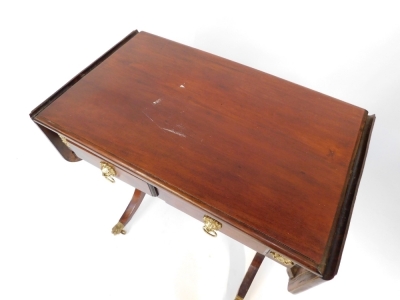 A Regency style mahogany sofa table, with two frieze drawers, raised on outswept supports, brass capped castors, united by a straight stretcher, 83cm high, 84cm wide, 38cm extended, 49cm deep. - 2