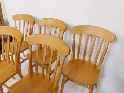 A pine kitchen table, raised on cream painted turned legs, 58cm high, 151cm wide, 81cm deep, together with six beech kitchen chairs. - 5