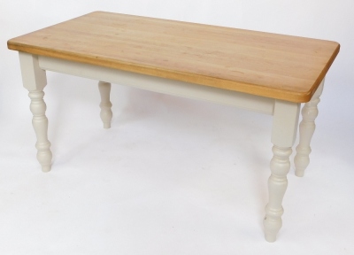 A pine kitchen table, raised on cream painted turned legs, 58cm high, 151cm wide, 81cm deep, together with six beech kitchen chairs. - 6