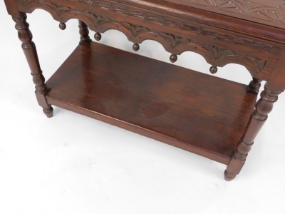 An Old Charm style oak rectangular coffee table, with carved sunburst decoration to top on frieze, raised on turned legs, united by an under tier, 70cm high, 91cm wide, 45cm deep. - 3