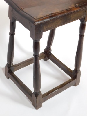 An 18thC oak joint stool, raised on turned legs united by a box stretcher, 64cm high. - 3